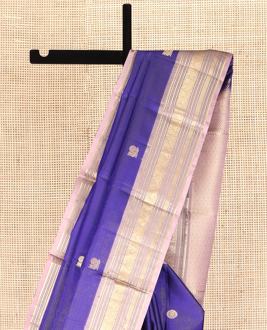 Blue Vasundhara Silk Saree, Ornamented With Vaira Oosi Stripes, Mayil and Chakram Buttas, Complemented by Contrast Border of Rekku, Mayil, Mayil Kann, and Ara Maadam Designs, Grand Pallu and Paired with a Contrast Blouse