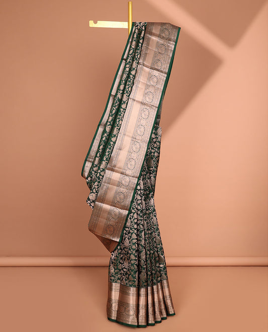 Green floral jacquard kancheepuram silk saree with self border of rekku, banaras, paun designs & floral zari design pallu