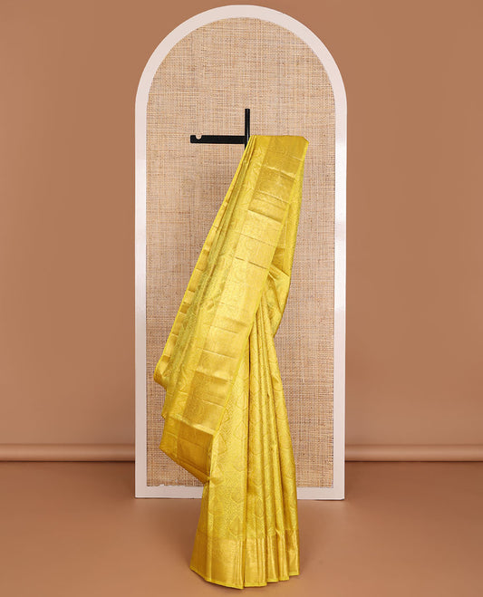 Yellow jacquard wedding silk saree, self-border of rekku,kodi visiry & mayil kann & jaal pallu