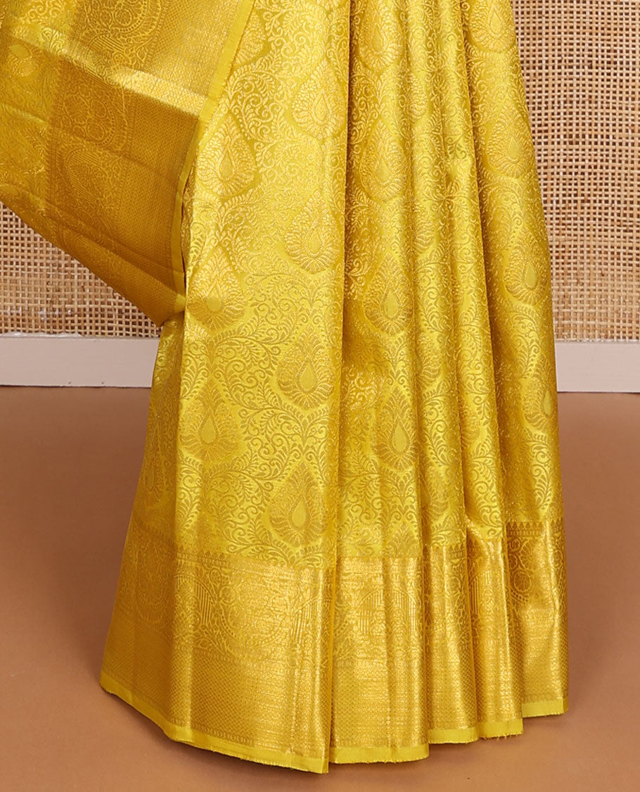 Yellow jacquard wedding silk saree, self-border of rekku,kodi visiry & mayil kann & jaal pallu