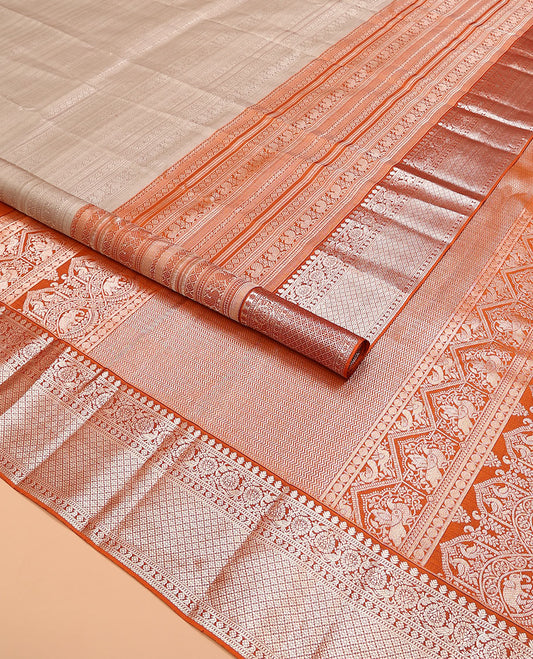 Cream jacquard kanchipuram silk saree, contrast traditional zari design steeped border, and pallu of vanki designs