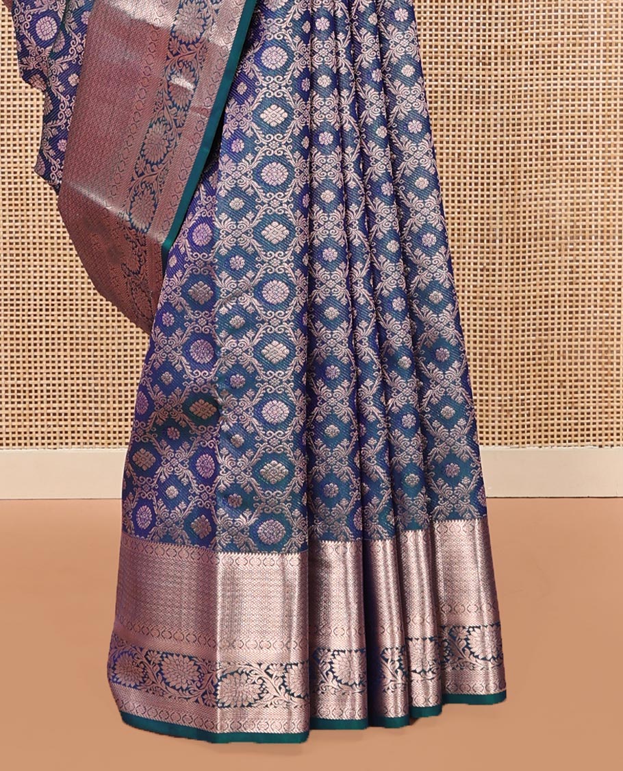 Blue Kanchipuram Wedding Silk Saree, Gleamed Up with Jacquard Designs on Its Body, Highlighted by a Zari Border of Rekku, Laddu Kamalam, Mayil Kann, and Kodi Visiry Designs, Grand Jaal Pallu, and Paired with a Matching Blouse