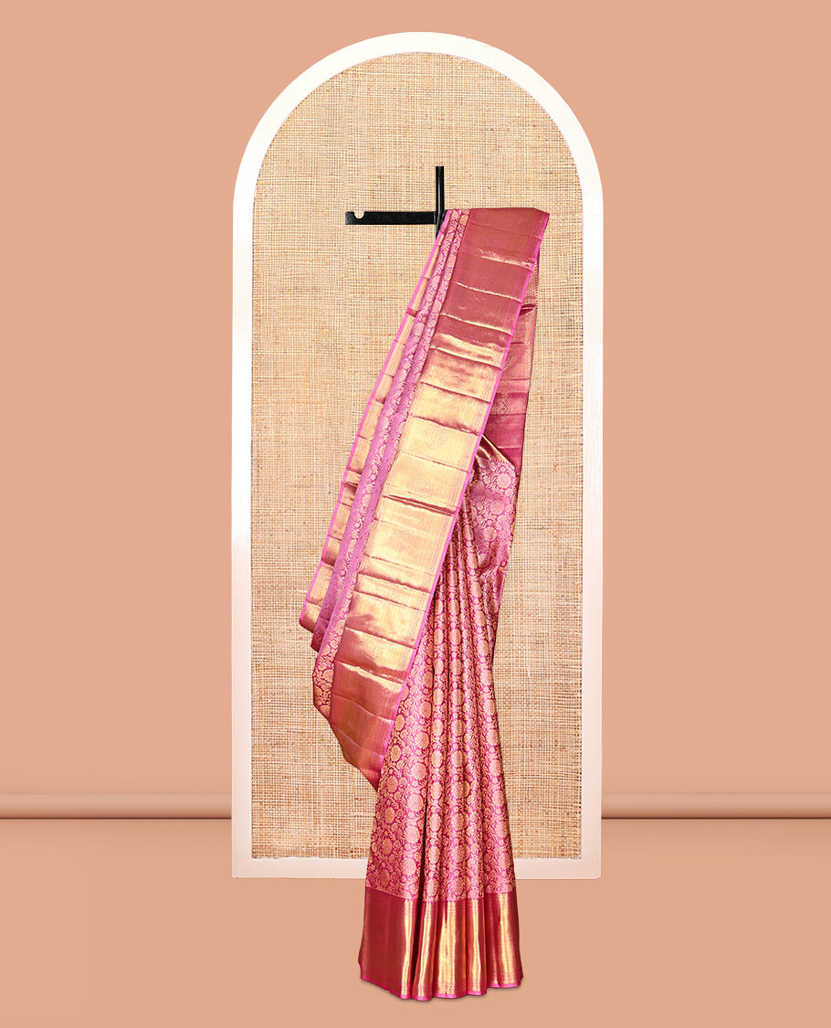 Pink Kanchipuram Wedding Silk Saree, Spotlighted with Jacquard Design, a Traditional Zari Border, a Grand Jaal Pallu, and a Matching Blouse