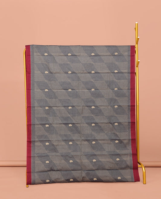 Grey Kanchi Cotton Saree, Subtly Woven with Paisleys and Stripes All Over Its Body, Complemented by Contrast Border, Pallu of Flower Pot Designs and Paired with a Matching Blouse