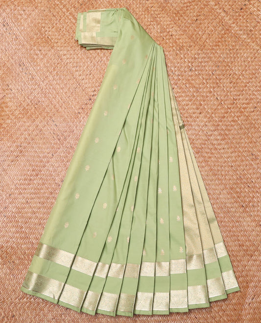 Pista Green Budget Silk Saree, Bedecked with Zari Buttas All Over Its Body, Highlighted  by Traditional Zari Design Border of Peacock Designs, Gleaming Pallu of Jaal Designs, and Paired with a Matching Blouse
