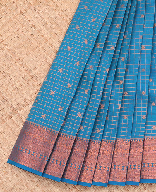 Blue Budget Silk Saree, Detailed with Zari Buttas and Checks All Over Its Body, Highlighted by a Traditional Zari Design Border, Grand Pallu, and Paired with a Matching Blouse
