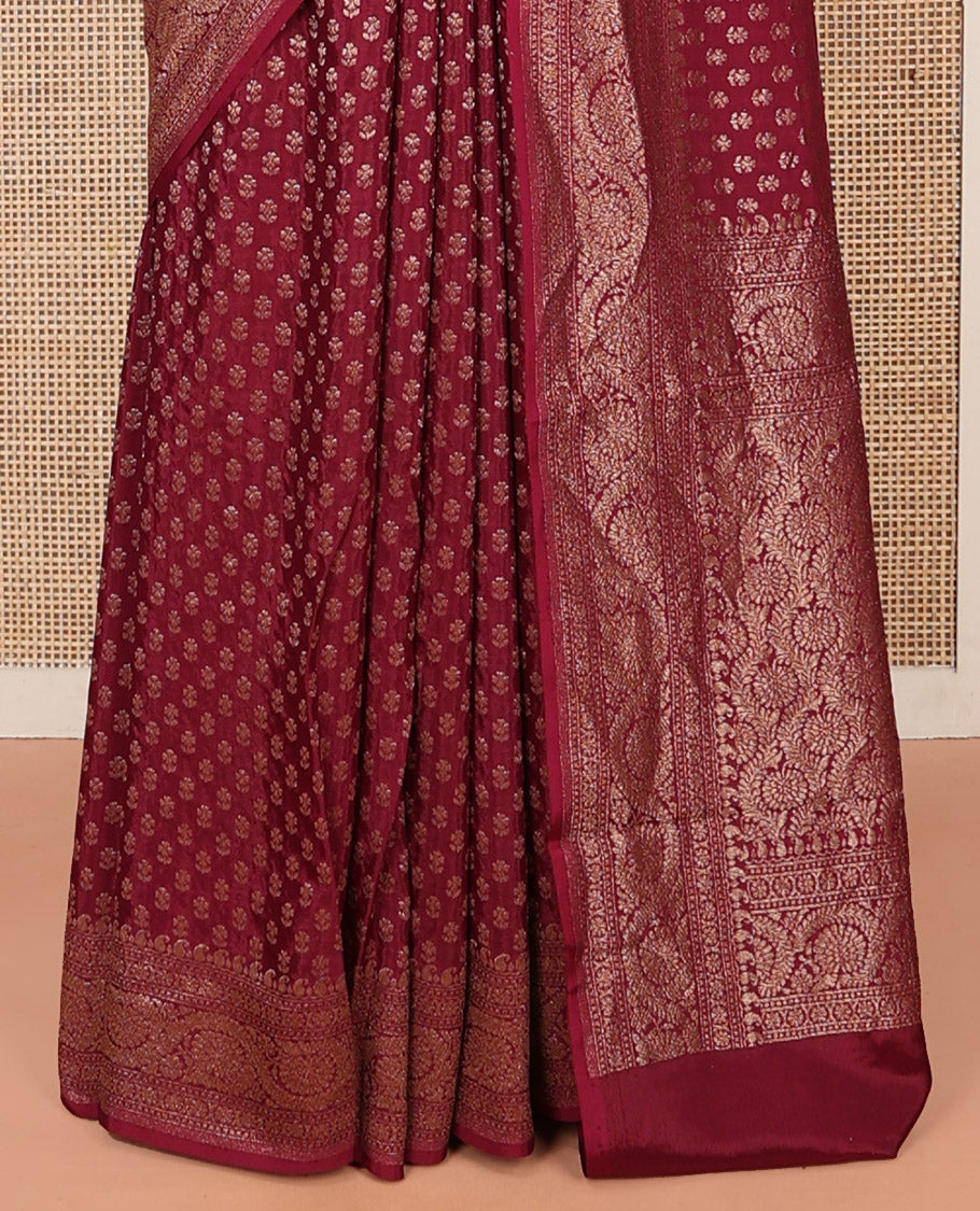 Light Maroon Fancy Crepe Saree, Steeped with Buttas, Highlighted by a Floral Creeper Border, Intricately Designed Pallu, and a Matching Blouse