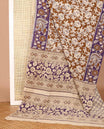 Brown floral vine machine-printed Kalamkari cotton saree, contrast floral creeper and peacock printed border, and pallu of floral, and geometric print