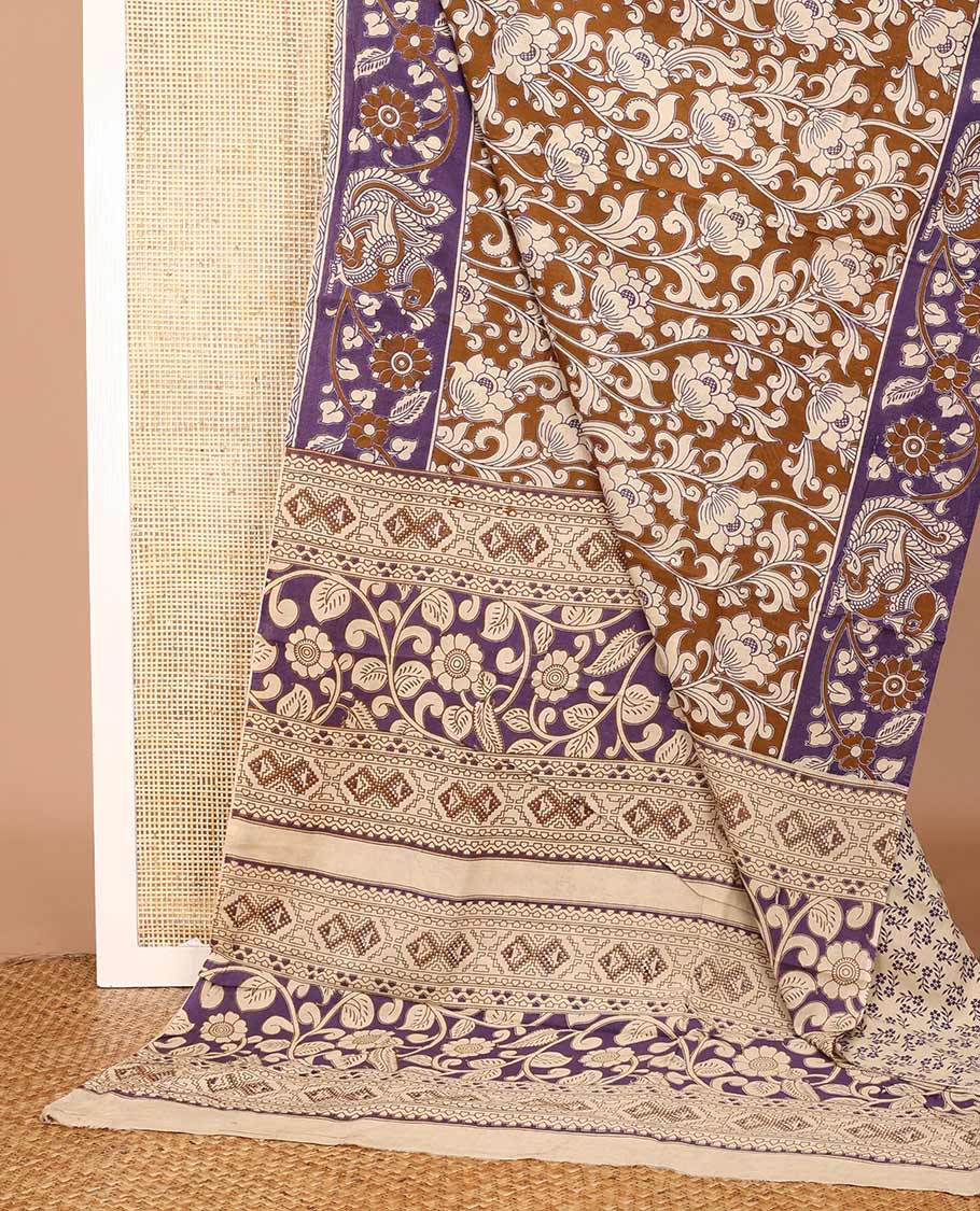 Brown floral vine machine-printed Kalamkari cotton saree, contrast floral creeper and peacock printed border, and pallu of floral, and geometric print