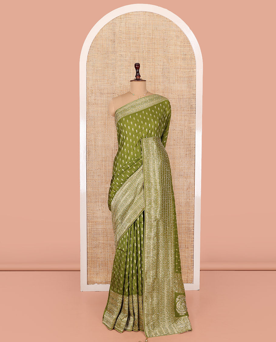 Green Dola Silk Saree, Adorned with Buttas on Its Body, Highlighted by Embroidered-Zari Work Border, Pallu of Embroidery and Zari  Work, and Paired with a Matching Blouse