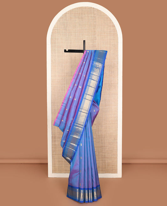 Violet zari buttas Kanchipuram silk saree, contrast one-sided border of paneer sombu, banaras, muthu, and vanki designs, and zari design pallu