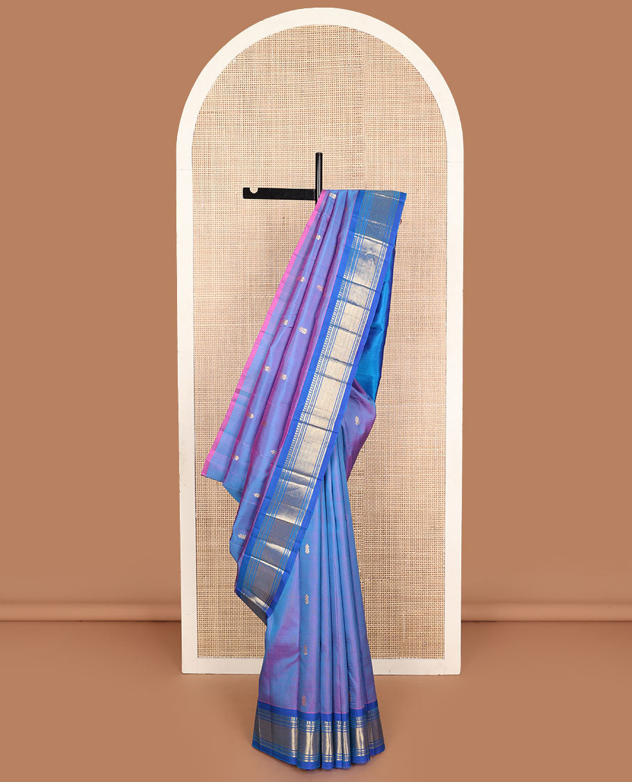 Violet zari buttas Kanchipuram silk saree, contrast one-sided border of paneer sombu, banaras, muthu, and vanki designs, and zari design pallu