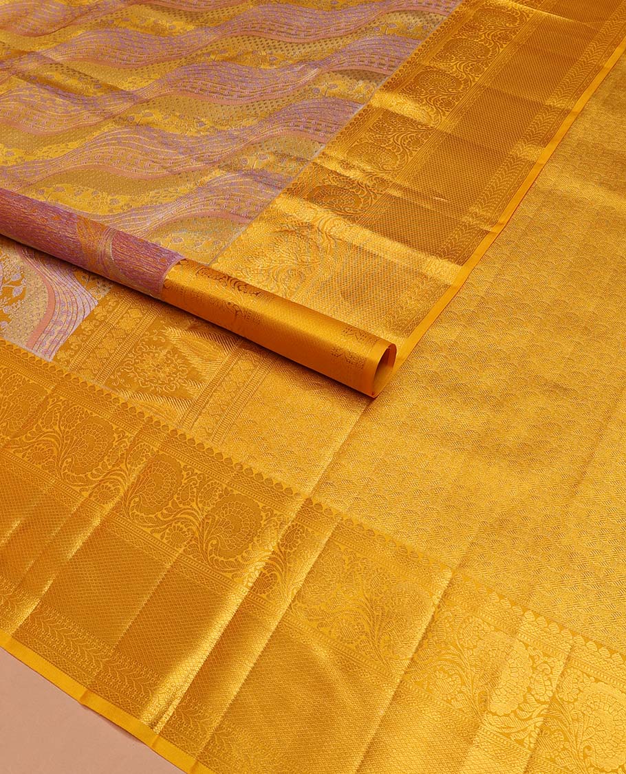Pink Kanchipuram Tissue Silk Saree, Mesmerized with Jacquard Design on Its Body, Complemented by a Contrast Border of Thilakam, Kodi Visiry, Muthu, Mayil Kann, and Kathir Designs, Pallu Steeped with Poun Designs, and Paired with a Contrast Blouse