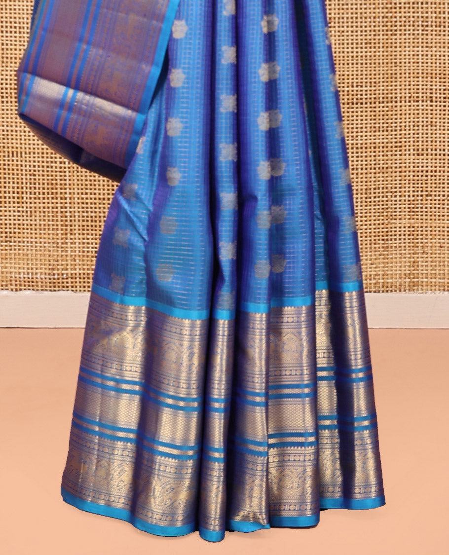 Blue Iruthalai Pakshi and Checked Kanchipuram Silk Saree, a Zari Border of Rekku, Kathir, Rudraksham, Yaali, Mayil Kann, Neli, Kamalam and Mayil Designs, Jaal Pallu, and a Matching Blouse