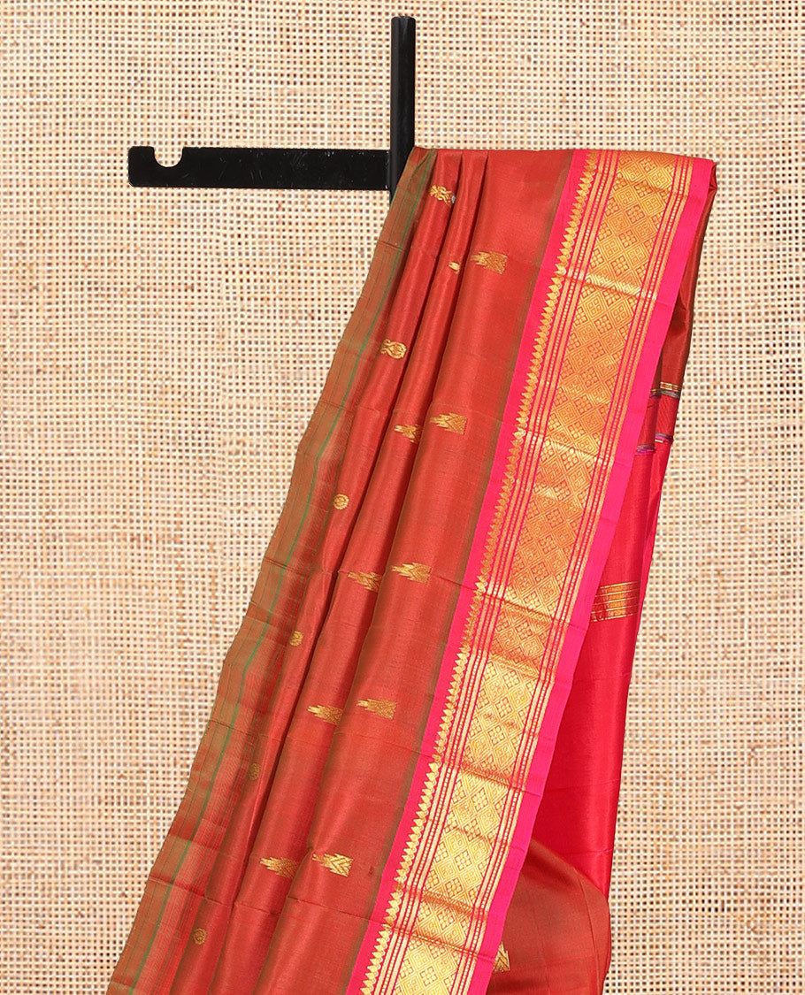 Rust Kanchipuram Silk Saree, Accentuated with Zari Buttas, Complemented by a Contrast Border of Thilakam Mokku, Banaras, Muthu, and Jaal Design, Pallu of Zari Design, and No Blouse