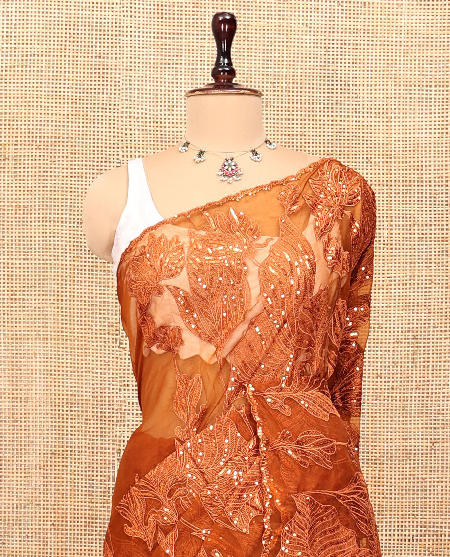 Orange Organza Saree, Gracefully Embellished with Floral Sequins-Thread Embroidery, Scallop-Embroidered Border, and a Matching Blouse