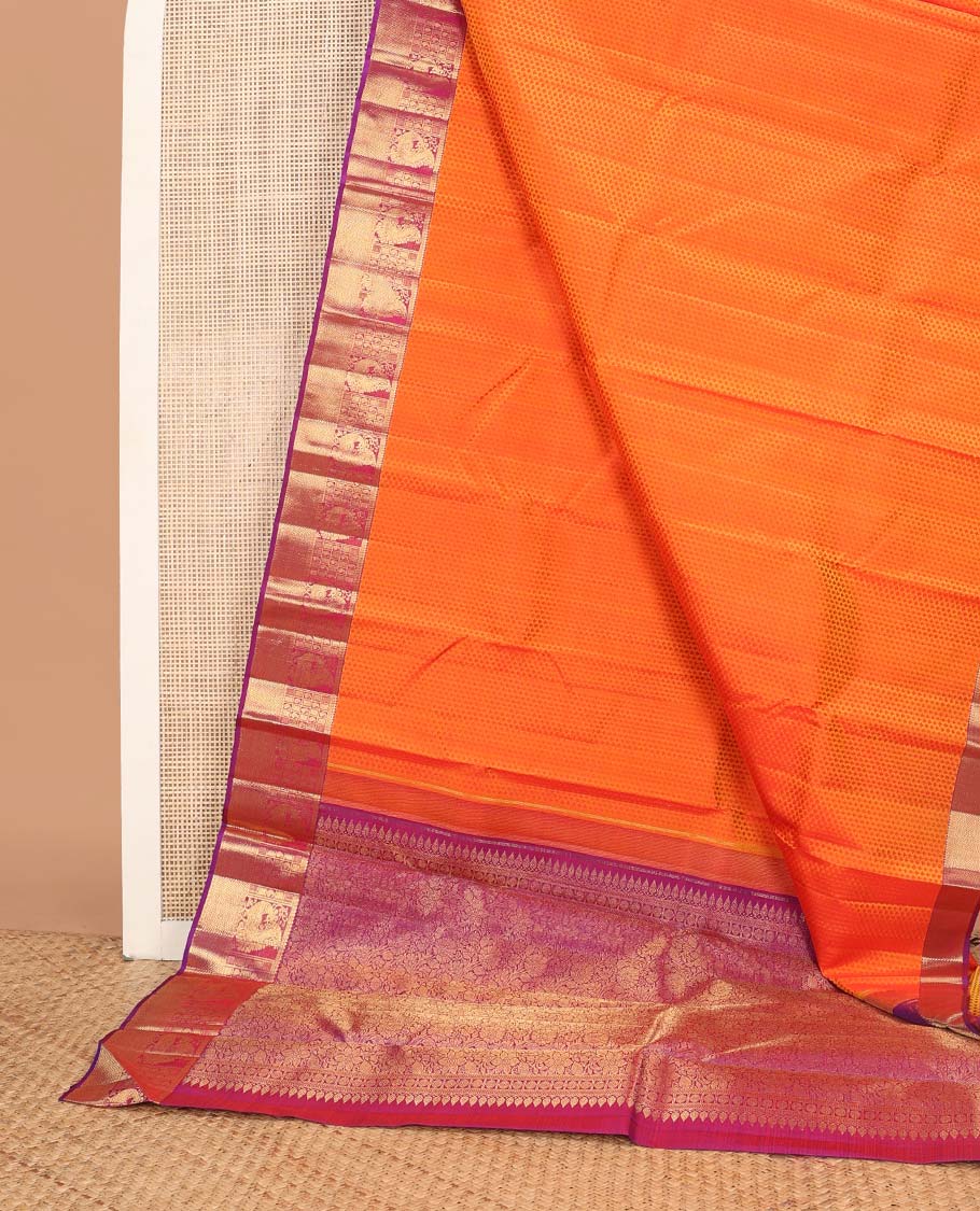 Orange floral design silk saree with contrast border of rekku, paun, mayil, manga, vanki design & floral design pallu