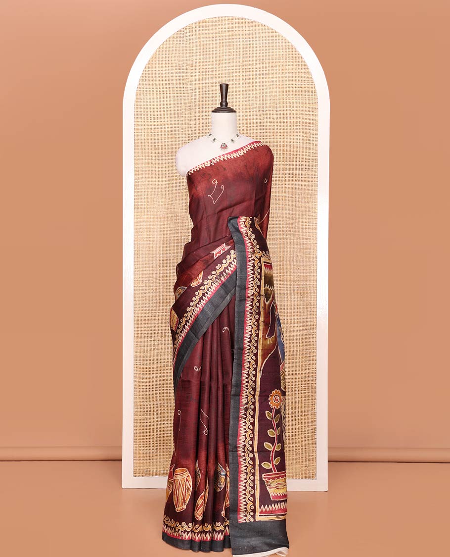 Maroon Printed Silk Saree Featuring Music Note Motifs and Musical Instruments Print, Complemented with a Contrast Temple-Printed Border, Pallu Picturing a Dancing Girl Motif Print, and Paired with a Matching Blouse