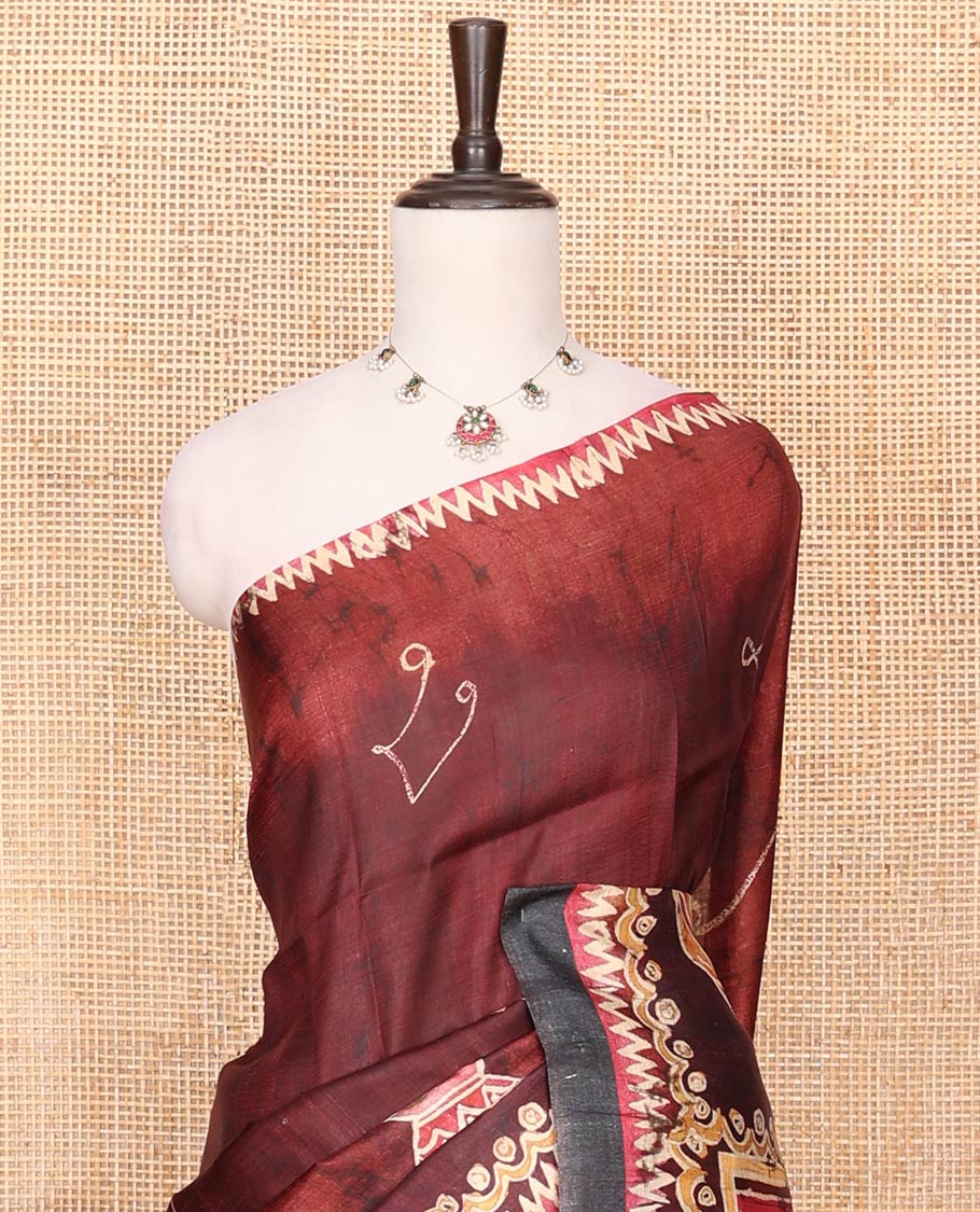 Maroon Printed Silk Saree Featuring Music Note Motifs and Musical Instruments Print, Complemented with a Contrast Temple-Printed Border, Pallu Picturing a Dancing Girl Motif Print, and Paired with a Matching Blouse