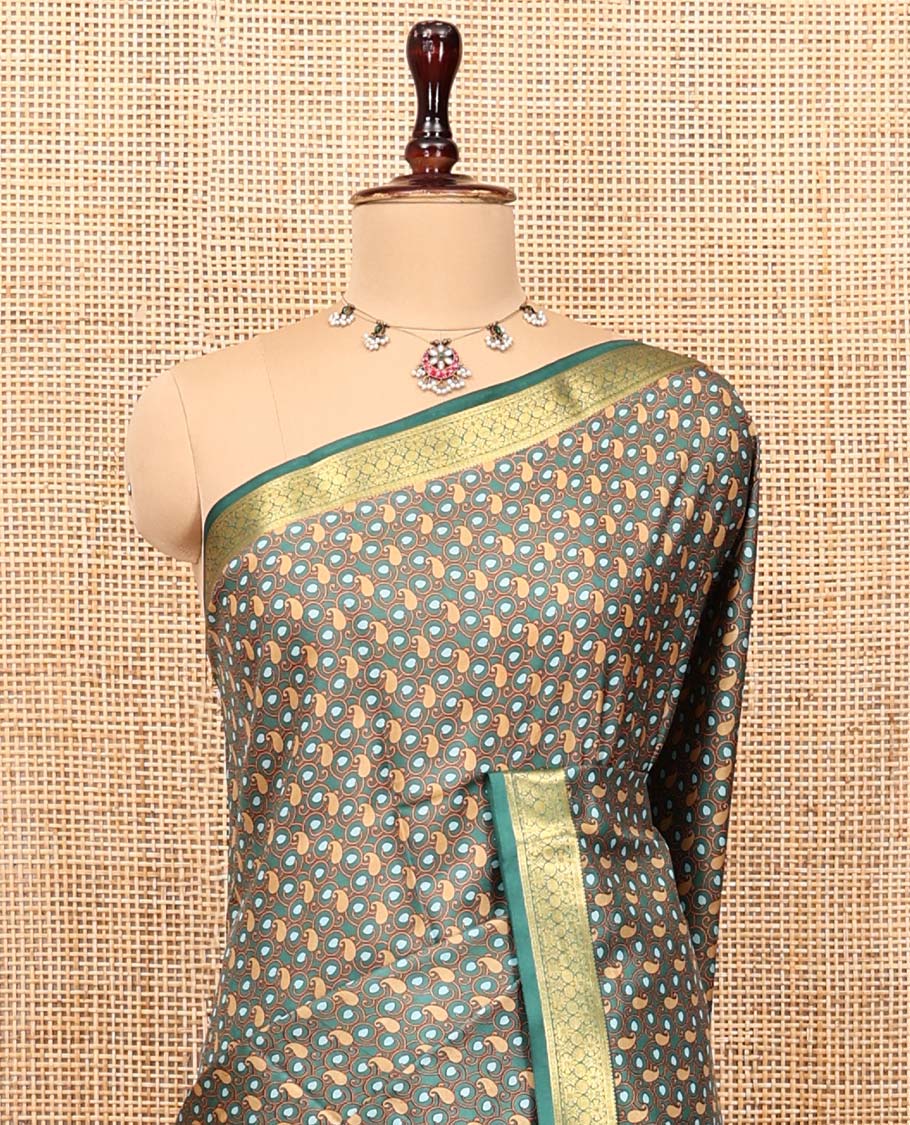 Green Printed Silk Saree, Steeped with Paisley Vine Designs, Highlighted by a Traditional Zari Border, Printed Pallu, and a Matching Blouse