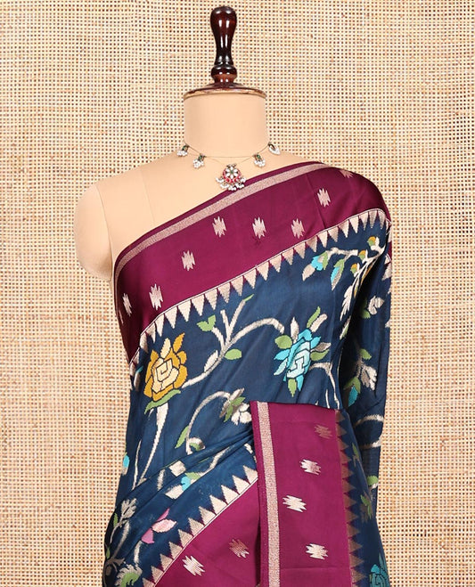 Blue Matka Silk Saree, Elegantly Highlighted with Meenakari Floral Vine Design All Over Its Body, Complemented by Contrast Temple Border of Buttas, Pallu of Floral Designs, and Paired with Contrast Blouse