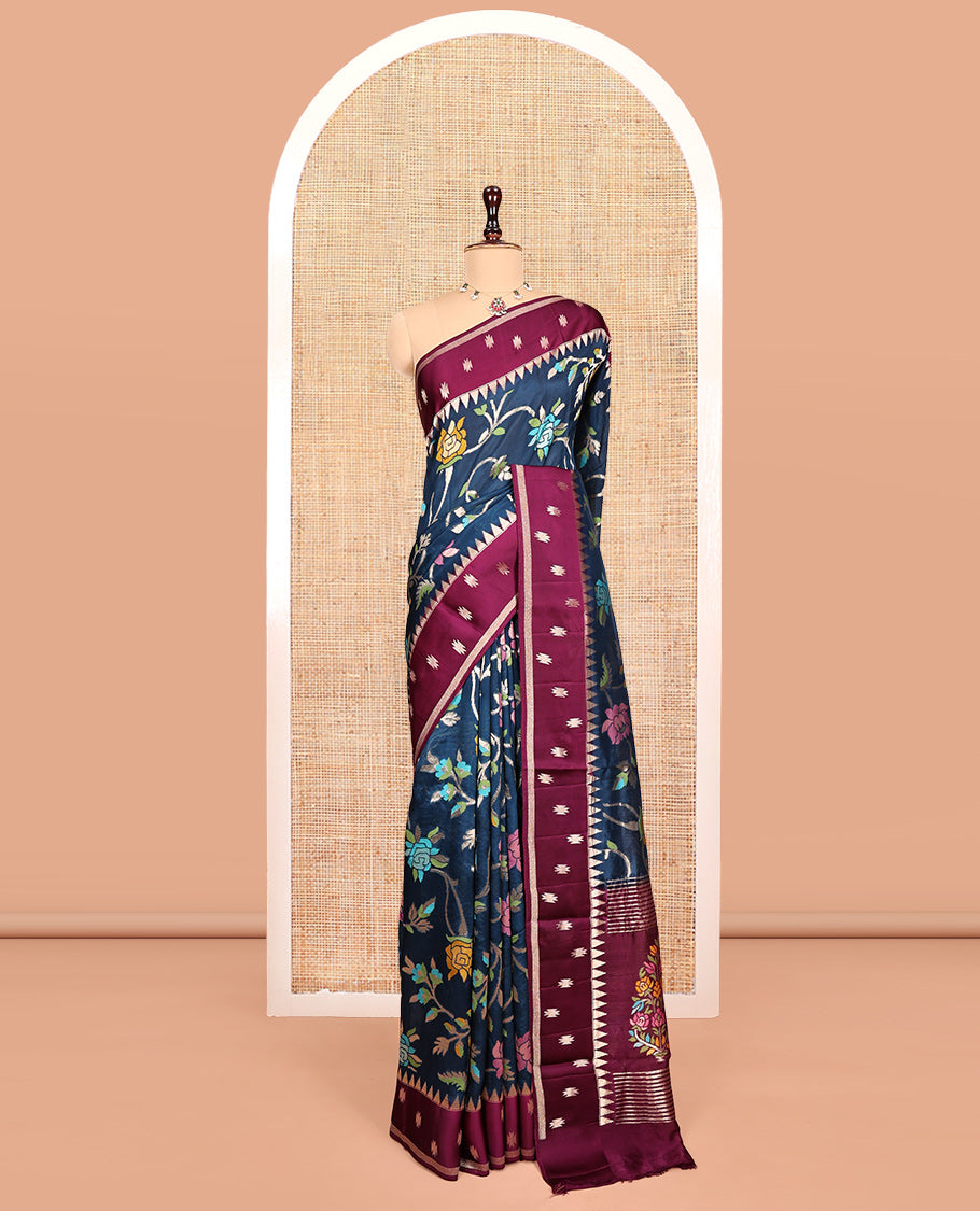 Blue Matka Silk Saree, Elegantly Highlighted with Meenakari Floral Vine Design All Over Its Body, Complemented by Contrast Temple Border of Buttas, Pallu of Floral Designs, and Paired with Contrast Blouse