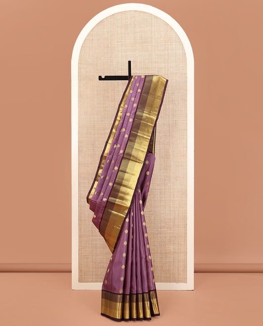 Purple Venkatagiri Silk Saree, Adorned with Zari Buttas All Over Its Body, Complemented by a Contrast Traditional Zari Border, Pallu of Diagonal Stripes and Buttas, and Paired with a Contrast Blouse