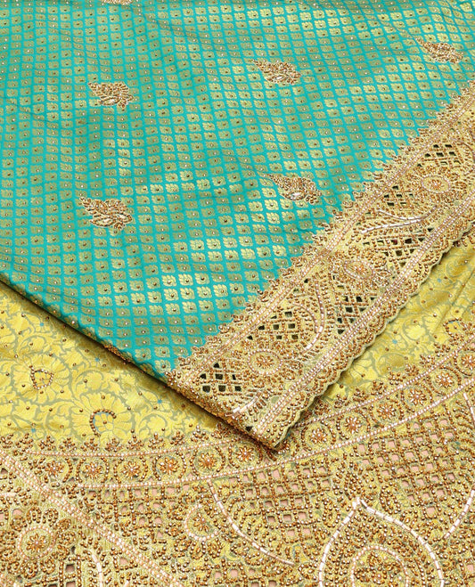 Green jacquard embroidered silk saree, contrast stone embroidered scallop zari design cut work border & zari woven & stone embroidered pallu
