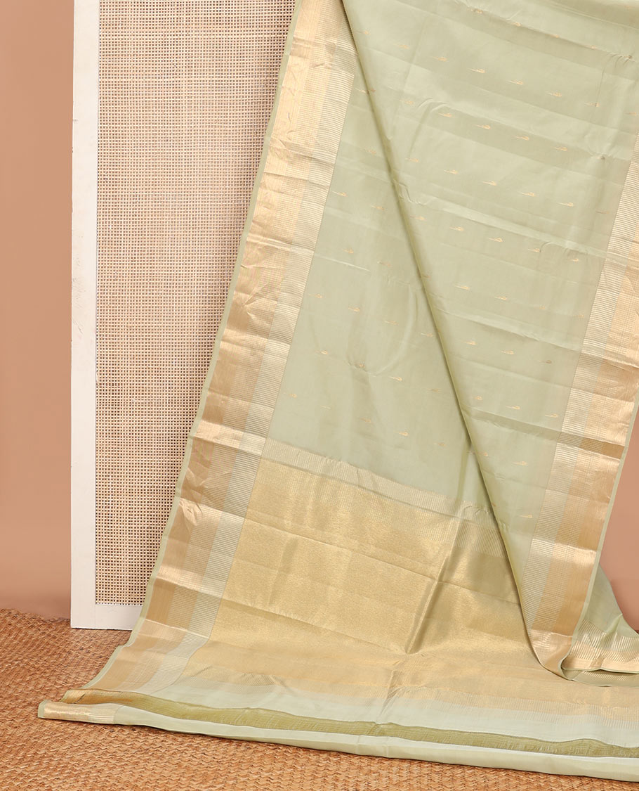 Off-white muniya buttas Vasundhara silk mix saree, seppu rekku zari border & pallu or seppu rekku design