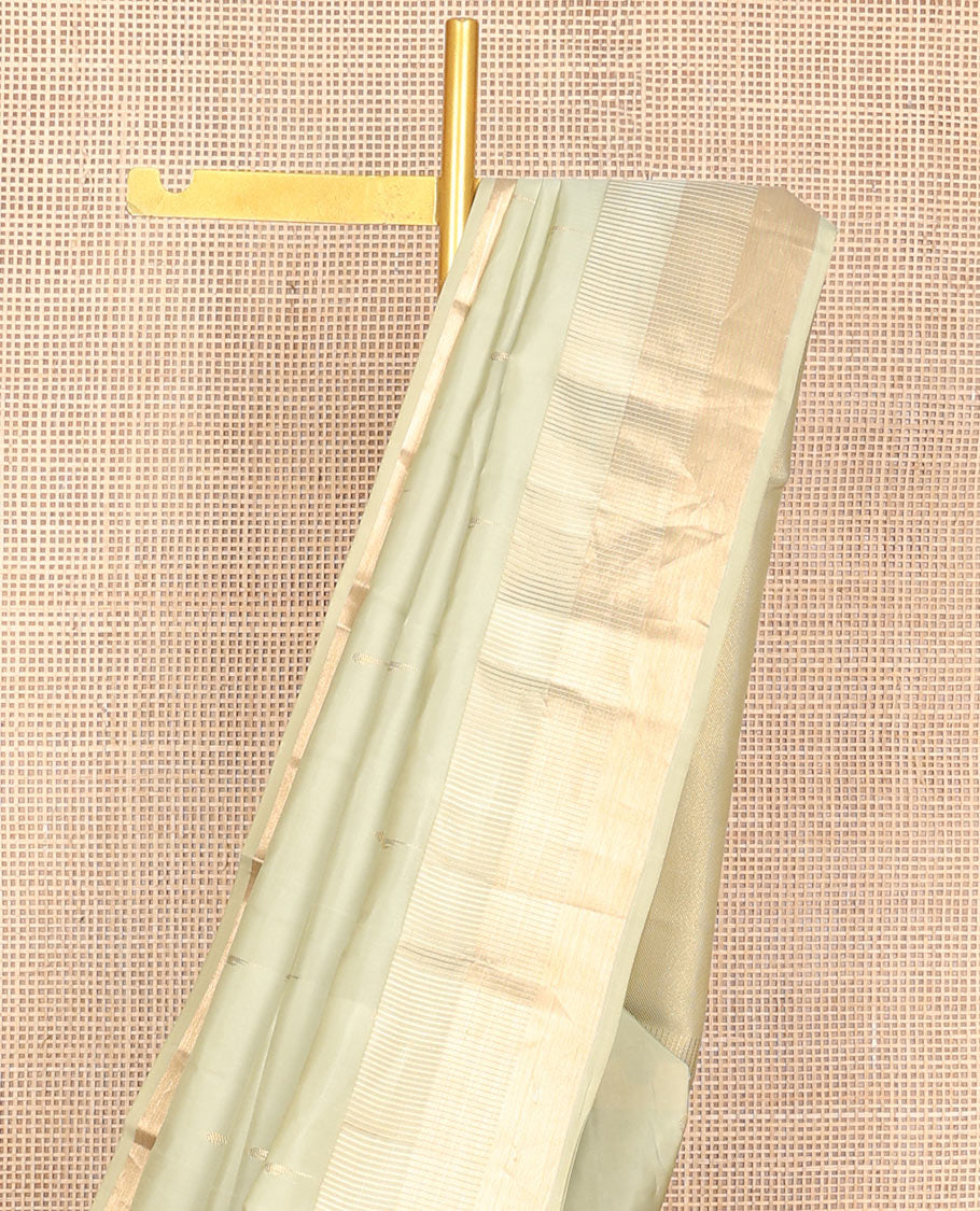 Off-white muniya buttas Vasundhara silk mix saree, seppu rekku zari border & pallu or seppu rekku design