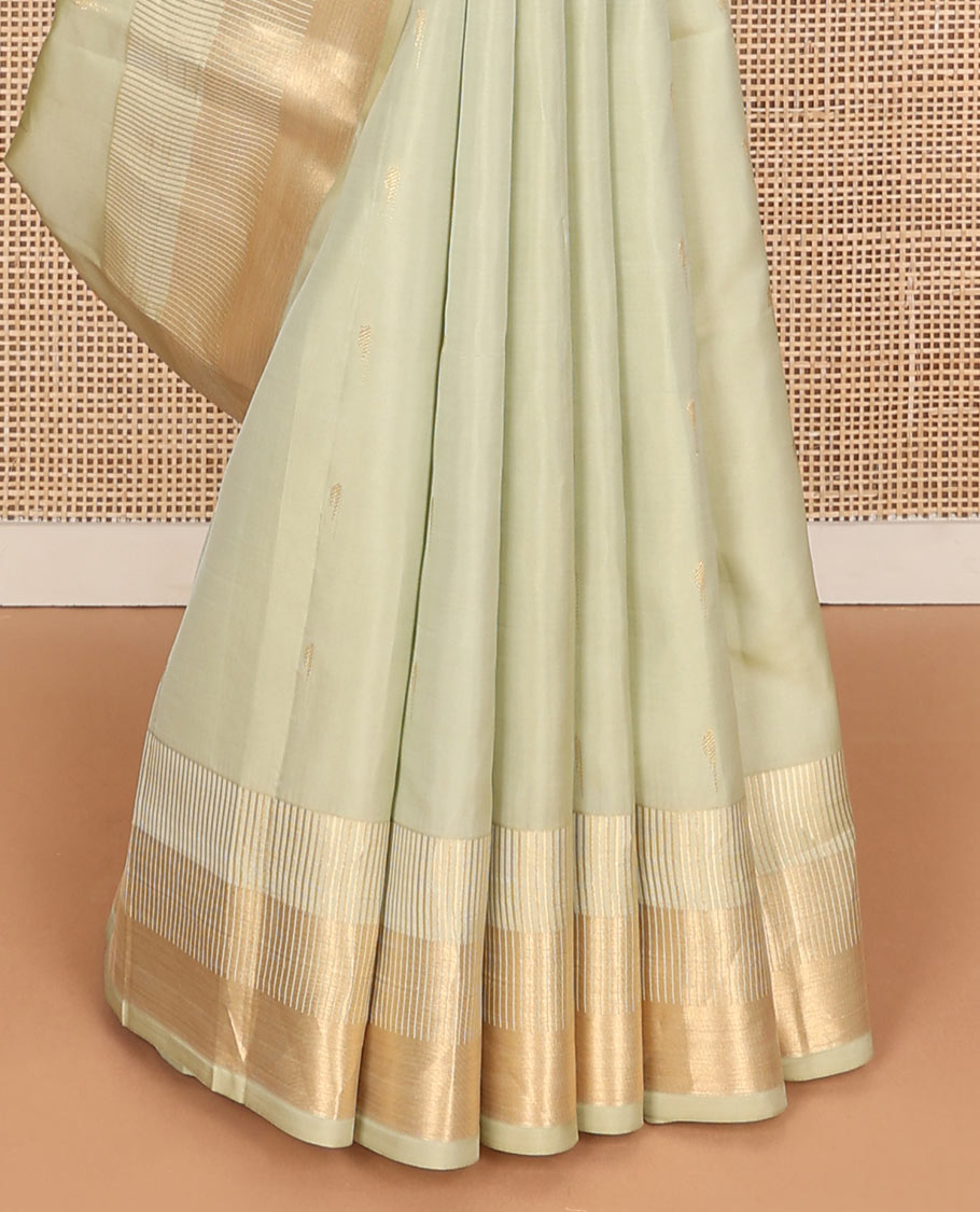 Off-white muniya buttas Vasundhara silk mix saree, seppu rekku zari border & pallu or seppu rekku design