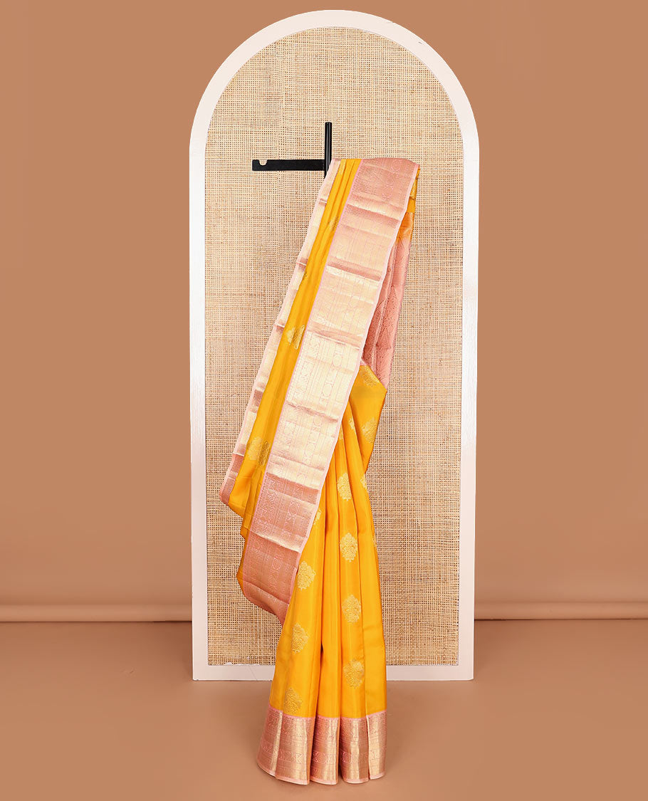 Yellow Vasundhara Lite Silk Mix Saree Ornamented with Singam Buttas, Complemented by a Contrast Border Featuring Yaanai, Mayil, Chakram, and Manga Designs, Intricately Zari Decked Up Pallu, and a Contrast Blouse