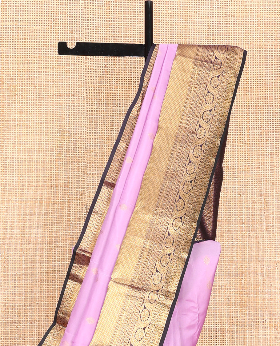 Lavender Vasundhara Lite Silk Mix Saree, Subtly Sparkled With Zari Buttas All Over Its Body, Complemented by Contrast Border of Salngai, Mayil Kann, Kamalam, and Dhavana Kodi Designs, Grand Jaal Pallu and Paired with a Contrast Blouse