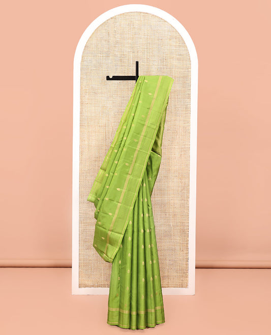 Green Vasundhara Lite Silk Mix Saree, Subtly Sparkled with Zari Buttas All Over Its Body, Highlighted by a Zari Striped Border, Jaal-Patterned Pallu, and Paired with a Matching Blouse
