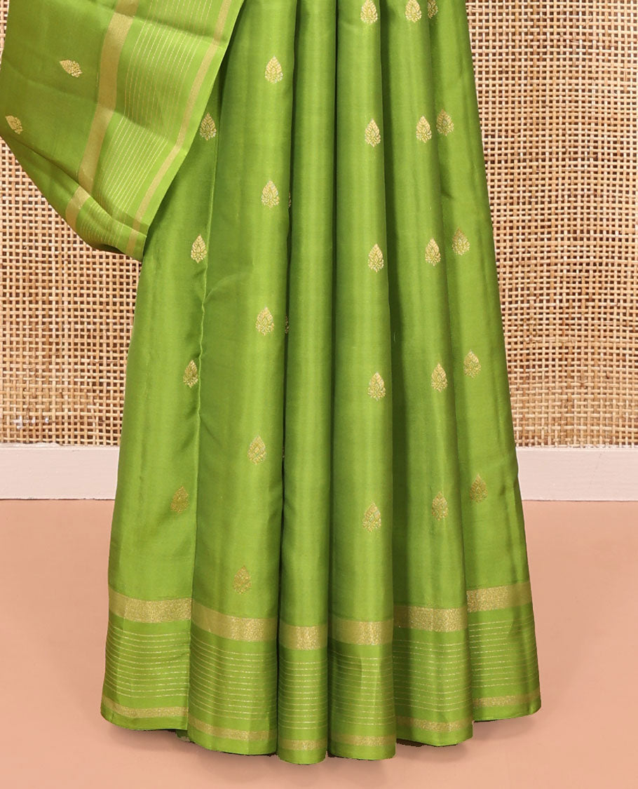 Green Vasundhara Lite Silk Mix Saree, Subtly Sparkled with Zari Buttas All Over Its Body, Highlighted by a Zari Striped Border, Jaal-Patterned Pallu, and Paired with a Matching Blouse
