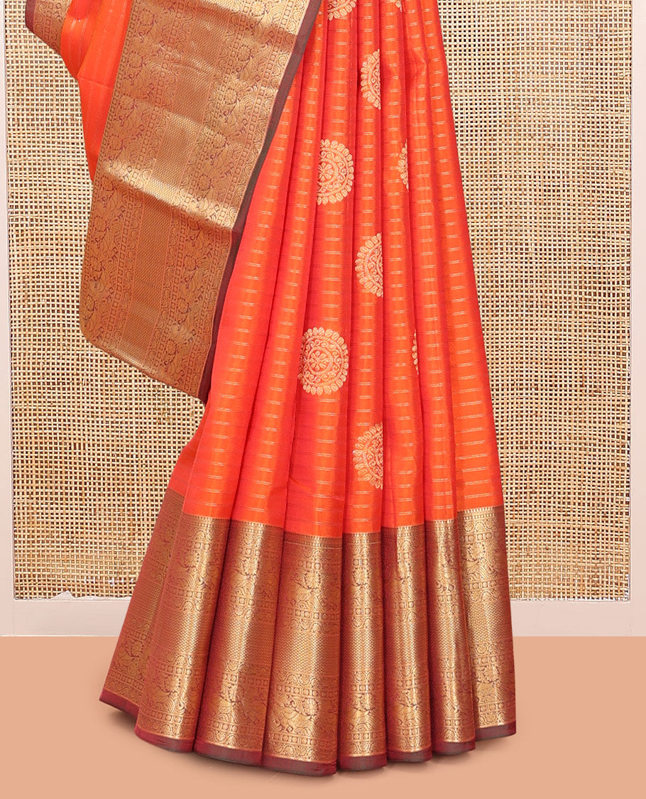 Orange Vasundhara Lite Silk Mix Saree, Bedecked with Zari Buttas and Stripes, a Contrast Border of Kodi Visiry, Mayil, and Mayil Kann Designs, Jaal Pallu, and a Contrast Blouse