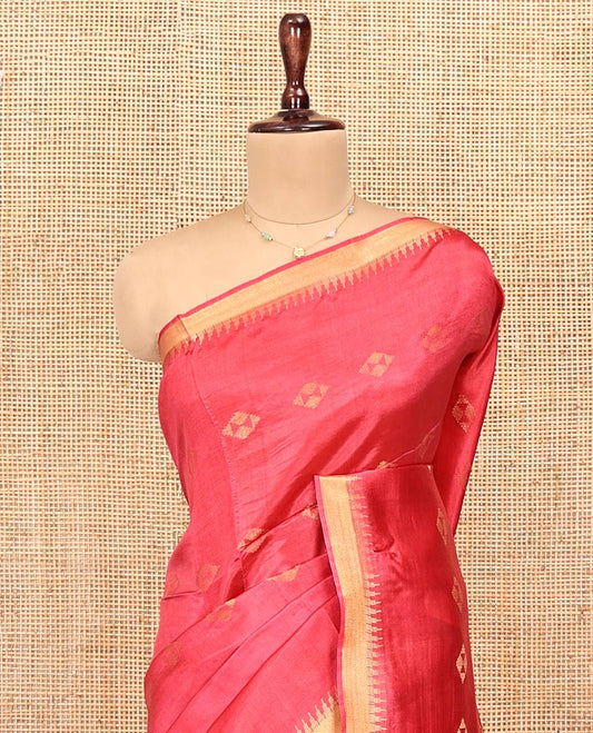 Red Banana Pith Saree, Detailed with Diamond Buttas on Its Body, Subtle Temple Border, Pallu Steeped with Zari Stripes, and Paired with a Matching Blouse