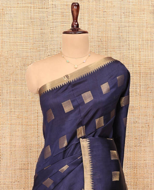 Blue Banana Pith Saree, Gleamed Up with Zari Buttas All Over Its Body, Highlighted by Zari Temple Border, Pallu Features Zari Stripes, and Paired with a Matching Blouse