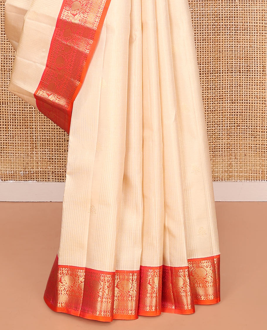Sandal Vasundhara Silk Saree, Sparsely Woven with Zari Buttas on Its Body, Complemented by Contrast Border of Rudraksham, Mayil, Chakram, Muthu, and Mayil Kann Designs, Grandly Decked Up Pallu, and Paired with a Contrast Blouse