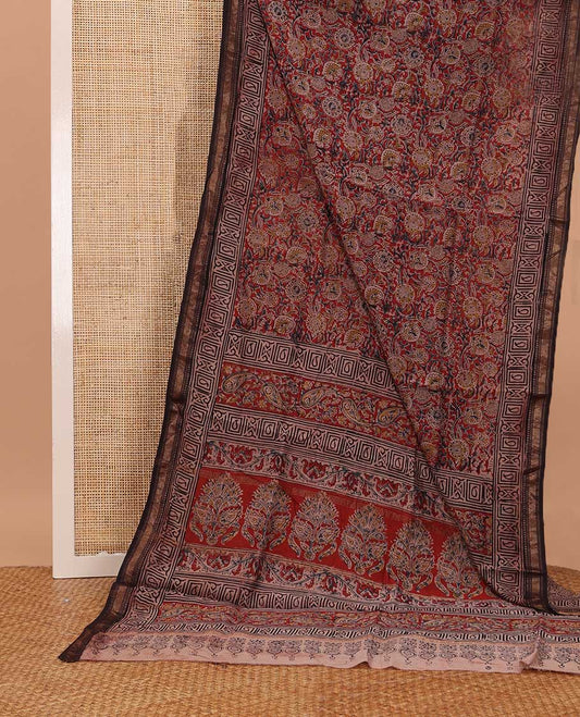 Red floral machine printed kalamkari cotton saree, contrast traditional zari border, and pallu of floral print
