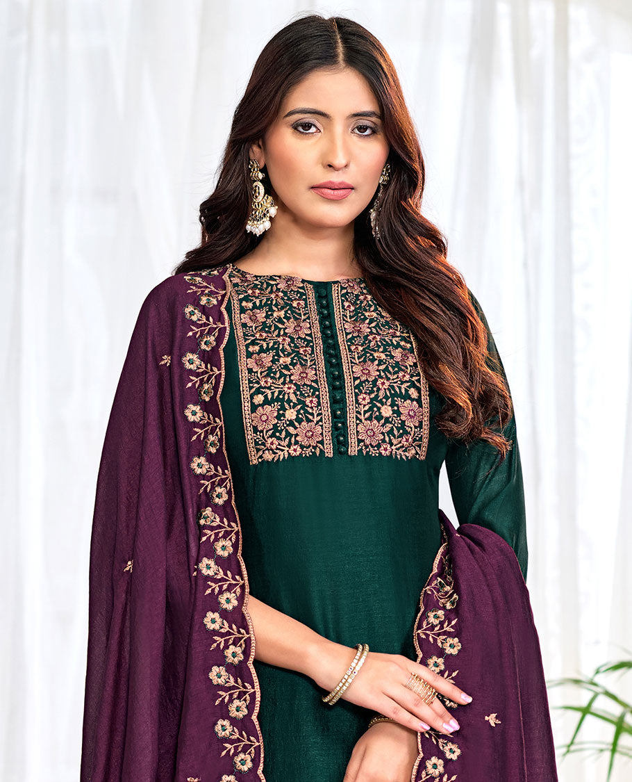 Dark green churidar material set, floral neck embroidered top, contrast plain bottom, and scallop floral embroidered dupatta
