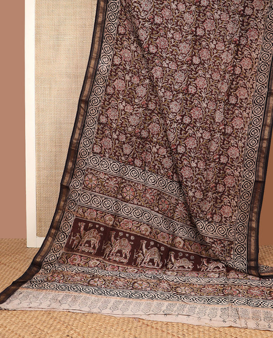 Brown floral vine machine-printed kalamkari cotton saree, zari border & pallu of floral creeper & camel motifs print