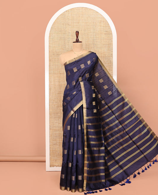 Blue Banana Pith Saree, Gleamed Up with Zari Buttas All Over Its Body, Highlighted by Zari Temple Border, Pallu Features Zari Stripes, and Paired with a Matching Blouse
