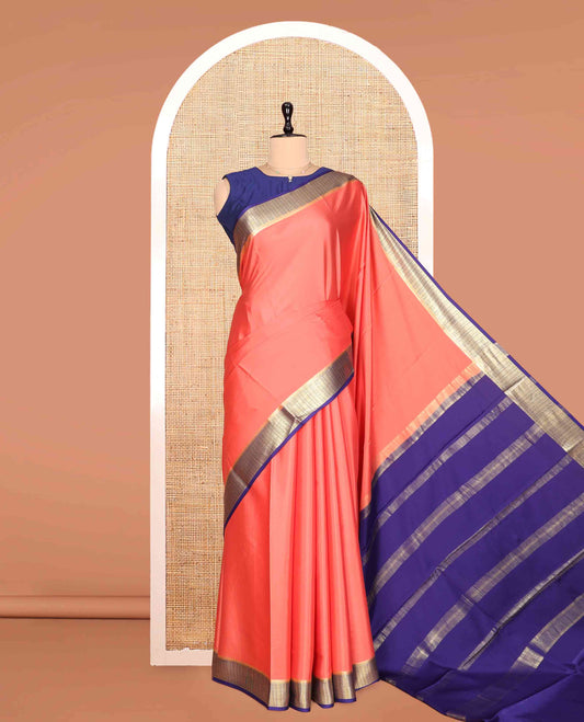 Peach Plain Mysore Silk Saree, a Contrast Traditional Zari Border, Zari Striped Pallu, and a Contrast Blouse