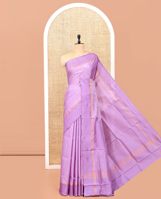 Lavender Plain Uppada Silk Saree, Complemented by a Plain Border, Zari Pallu, and a Matching Blouse