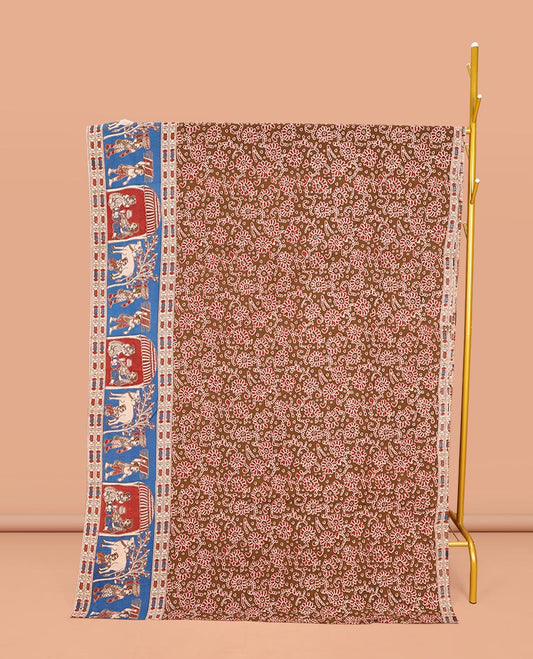 Brown Machine-Printed Kalamkari Cotton Saree, Accentuated with Floral Motifs on Its Body, Complemented by a Contrast Village-Theme Printed Border, Pallu of Peacock Motifs Print, and Paired with a Printed Blouse