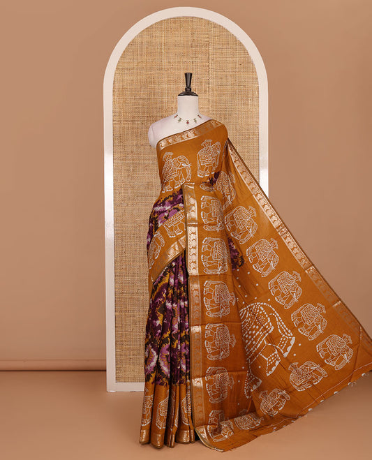 Purple-mustard shibori printed muslin cotton saree, contrast batik elephant print border of zari annam, batik elephant pallu, and contrast polka dots print blouse