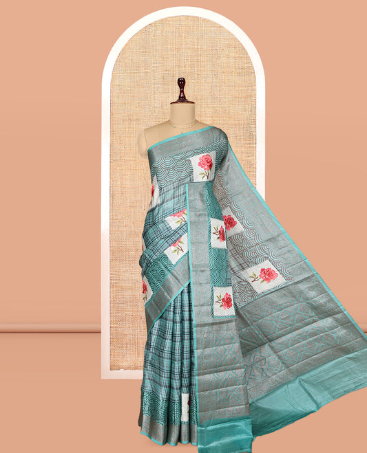 Blue Tusser Silk Saree Features Checks and Rose Buttas, a Zari Border, Grandf Pallu, and a Matching Blouse