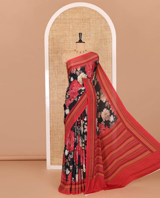 Black floral printed Italian crepe saree, contrast temple printed border, striped pallu, and a printed bordered blouse