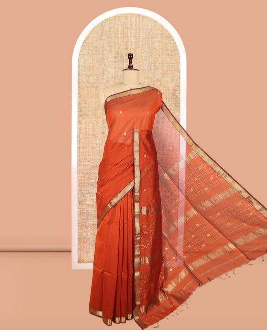 Rust Maheshwari Cotton Saree Featuring Zari Buttas, a Contrast Traditional Zari Border, Zari Striped Pallu, and a Matching Blouse